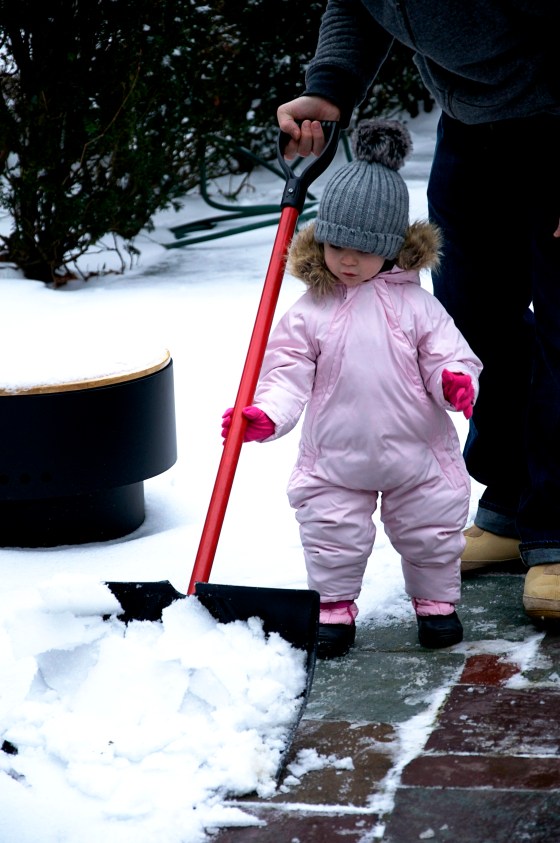 Ava shoveling