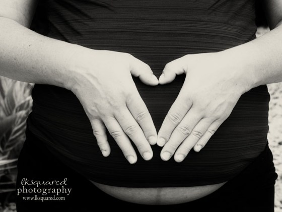 close up hand heart and belly